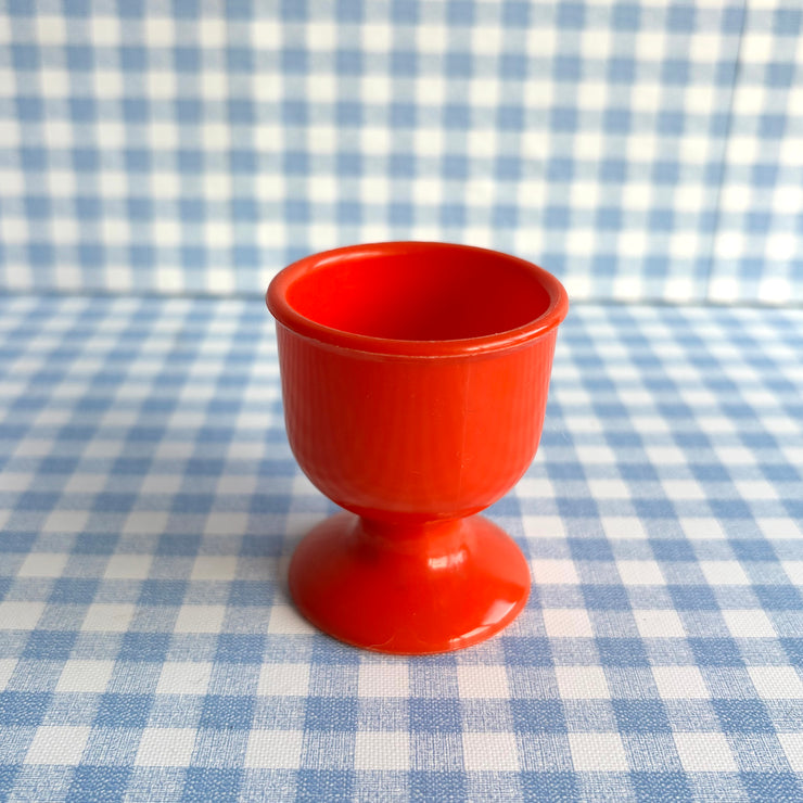 Coquetier rouge orangé