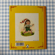 Livre Pinocchio joue aux cartes