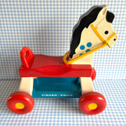 Jouet porteur cheval Fisher price