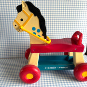 Jouet porteur cheval Fisher price
